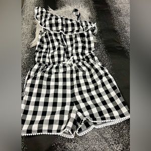 Jump suit, girls size 10-12, black and white Chex, short jumper. Cute look.